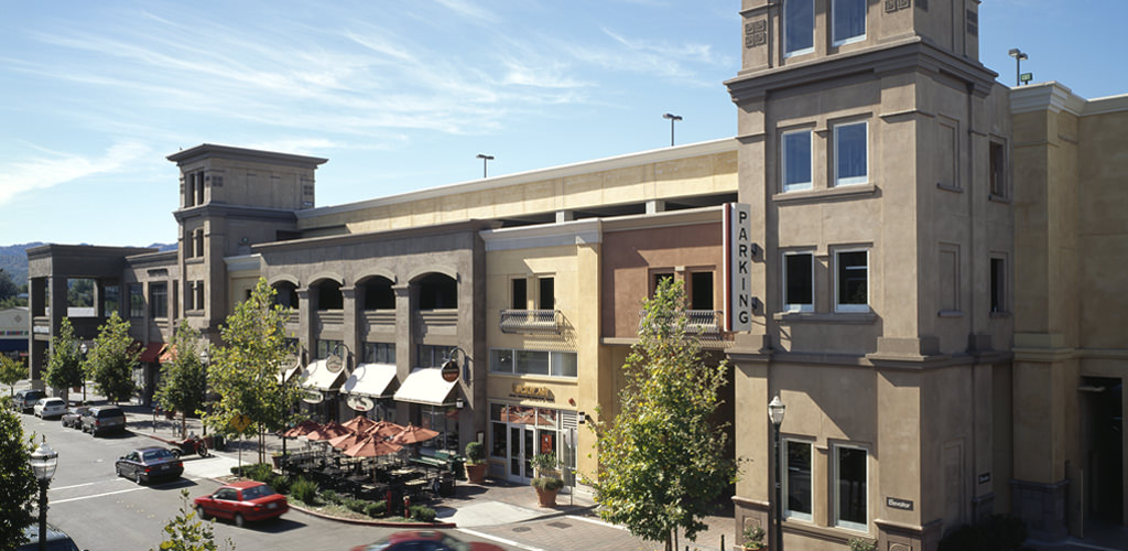 Slideshow image for Plaza Escuela Shopping  Center Parking Garages  & Retail Shell Buildings